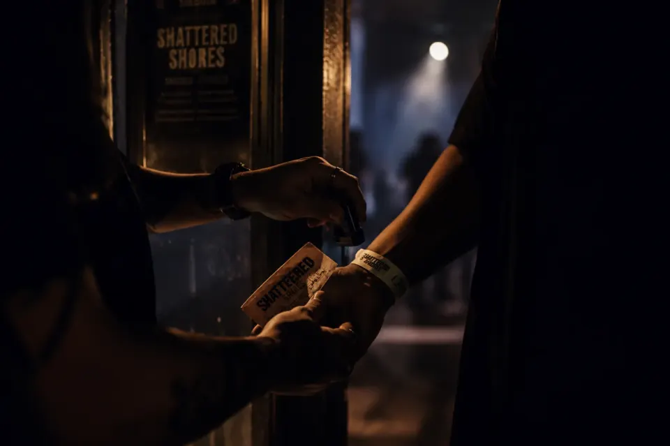 A wrist stamp at the entrance to a live show
